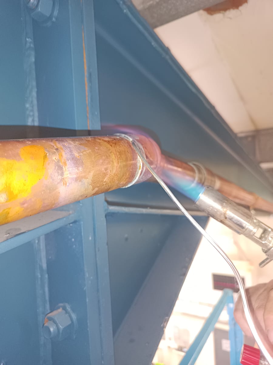 Brazing a copper pipe joint on site