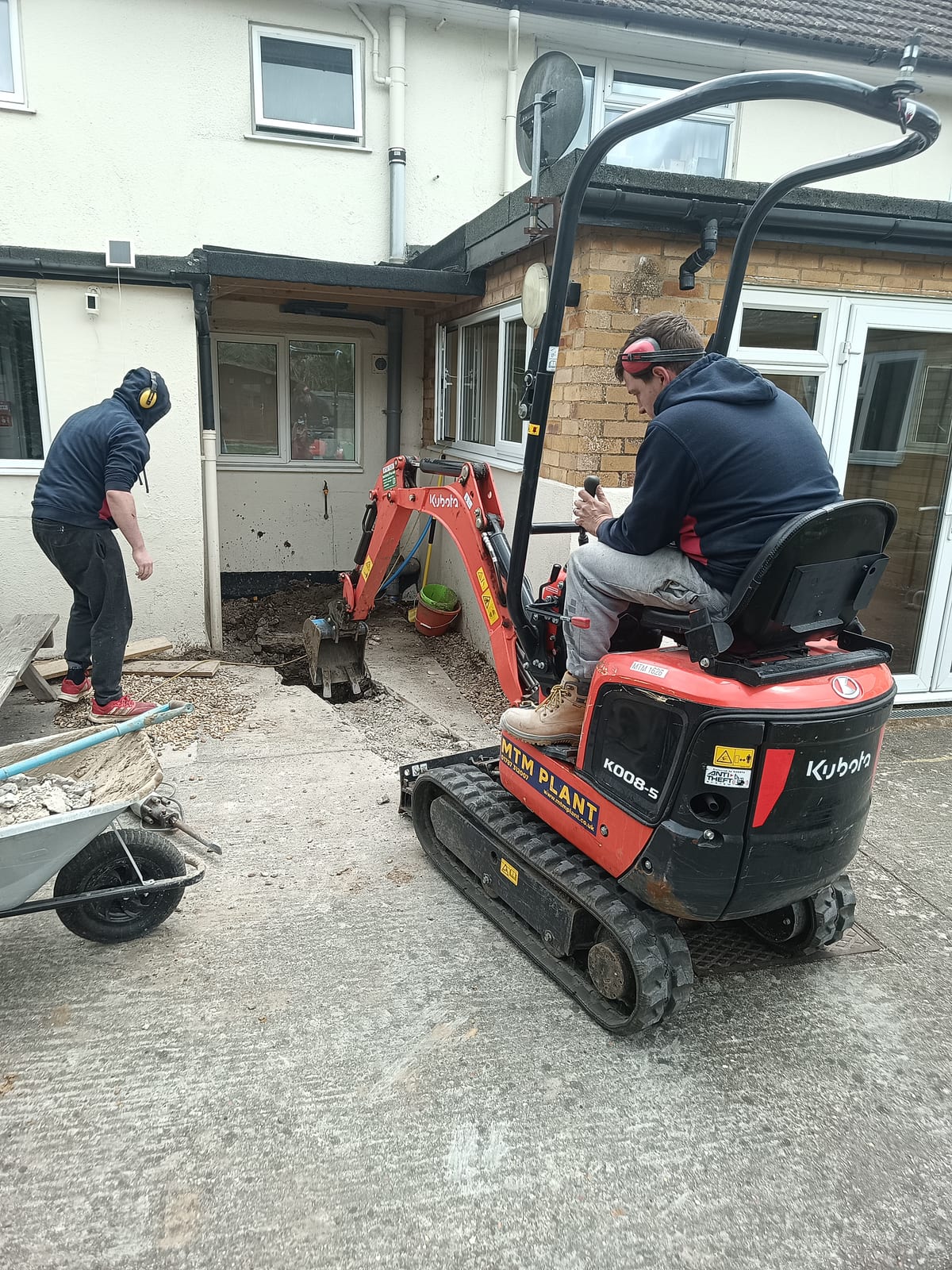 Kubota excavator digging on site