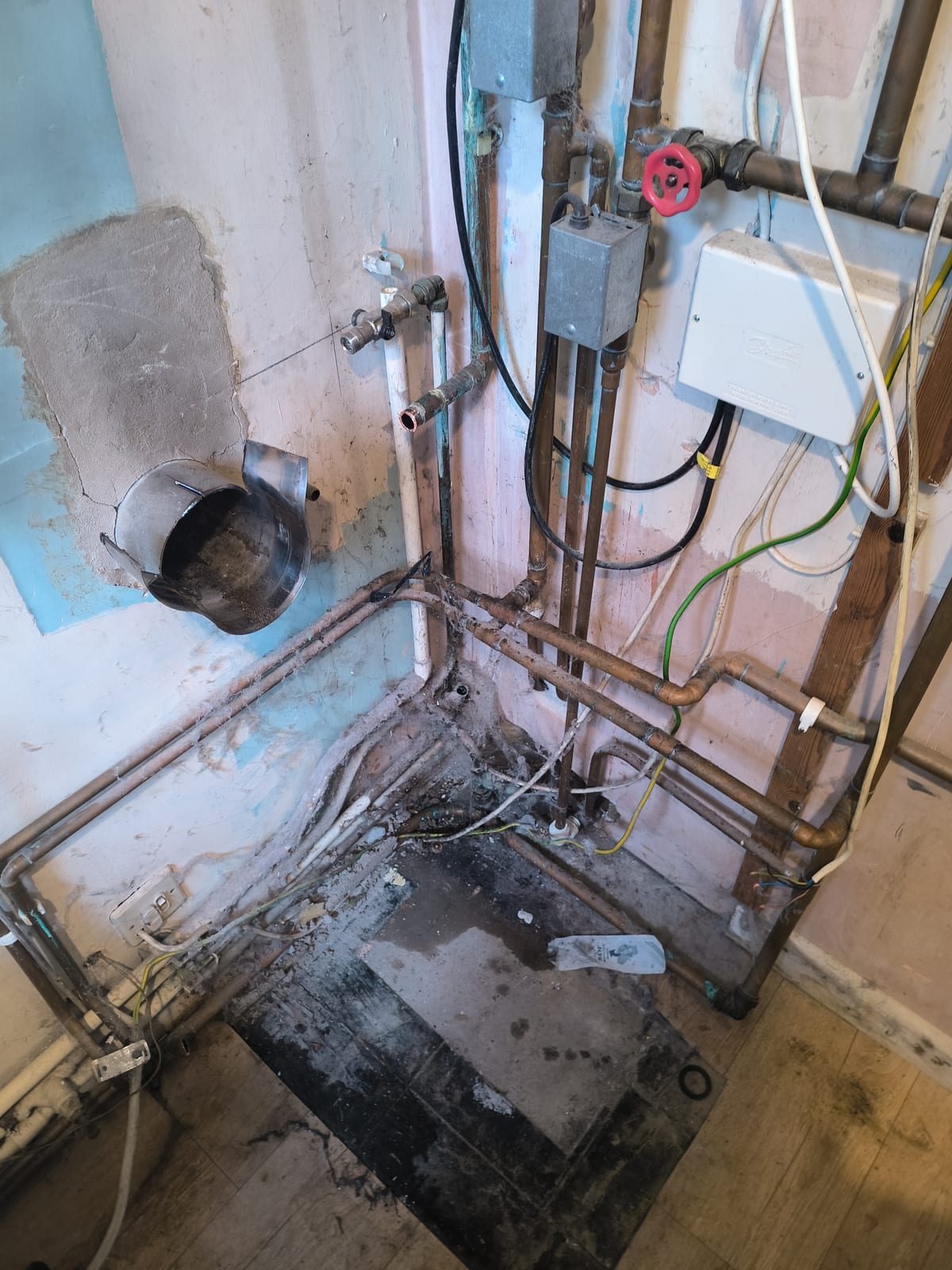 Plant room corner pipework and flue